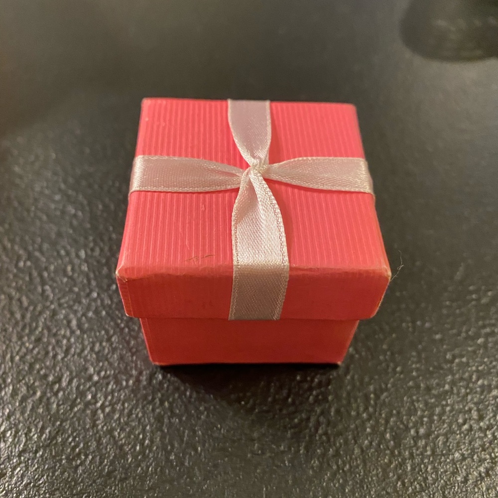 Woman’s watch ring.